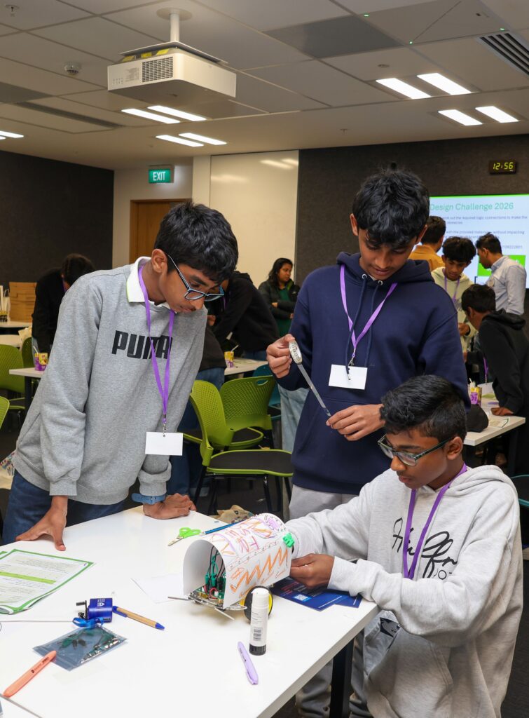 Young students engaging in a hands-on engineering activity at Little Engineers event.