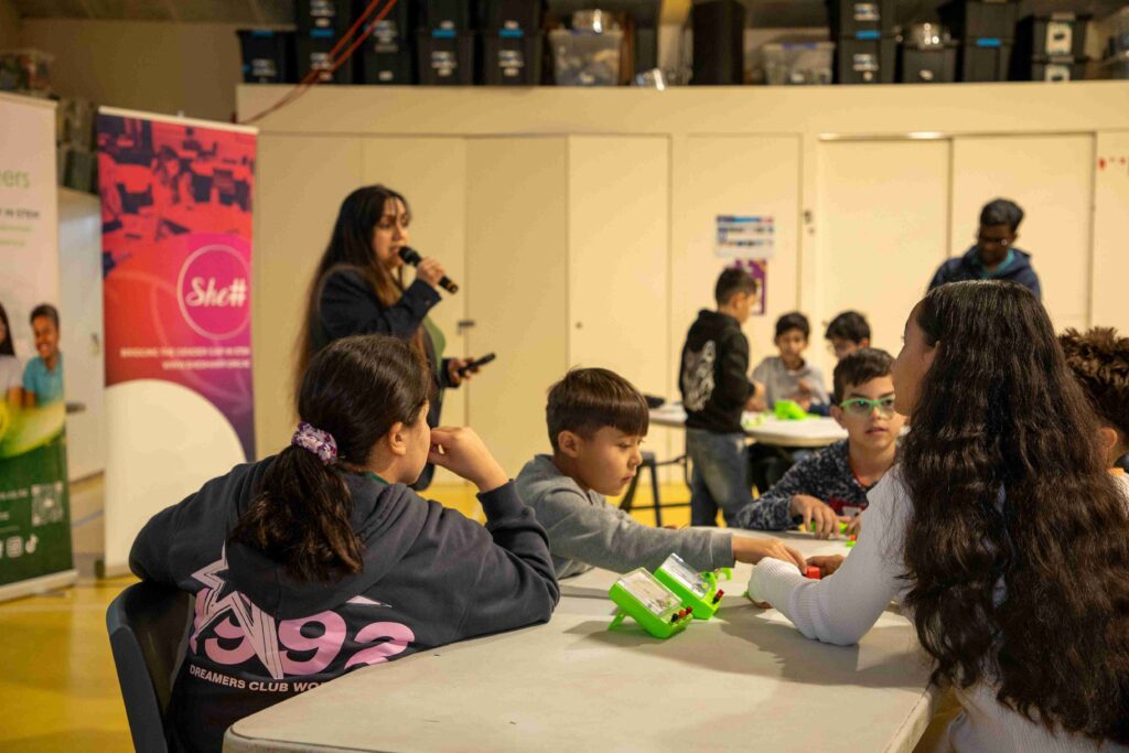Young girls and boys participating in an electronics workshop at Little Engineers.